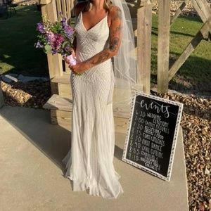 2021 David’s Bridal mermaid style wedding dress with veil, great condition